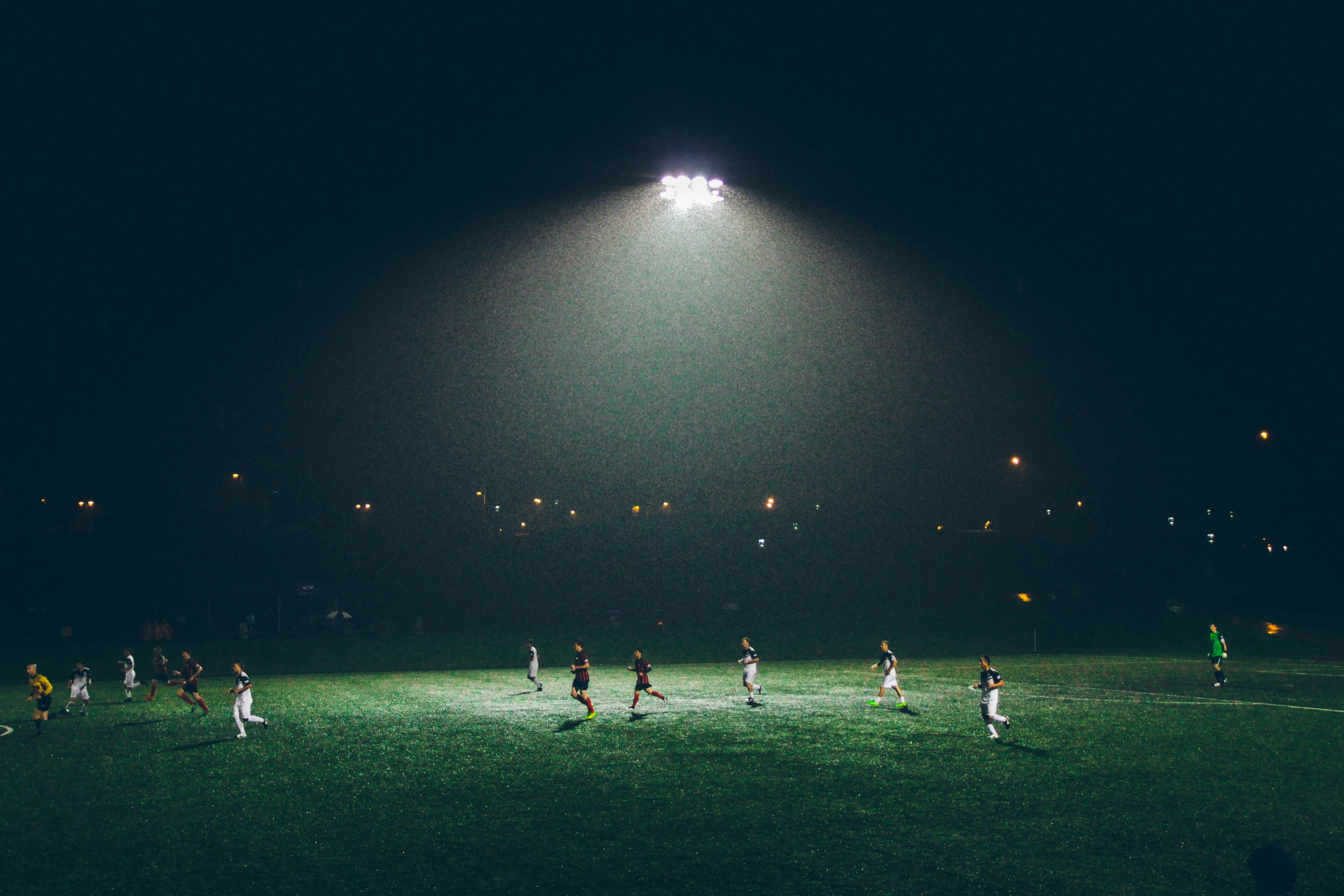 Estadio de fútbol de fondo